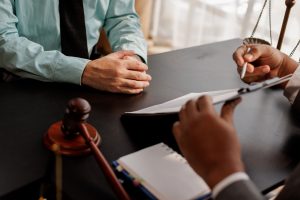 Michigan healthcare professional reviewing HPRP monitoring agreement requirements