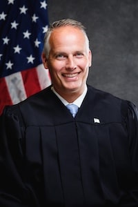 Judge Travis Reeds